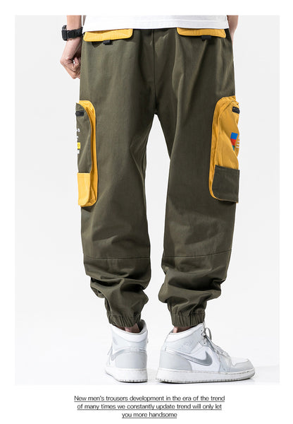 Pantalones cargo holgados con estampado de bloques de color y bolsillos grandes