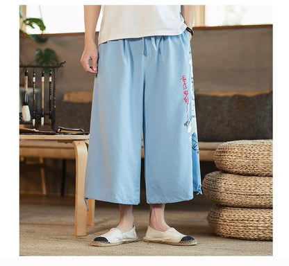 Printed cotton and linen cropped trousers