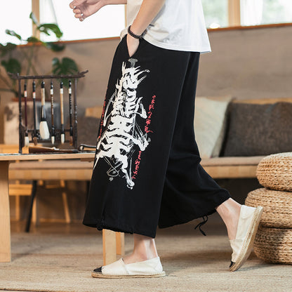 Printed cotton and linen cropped trousers