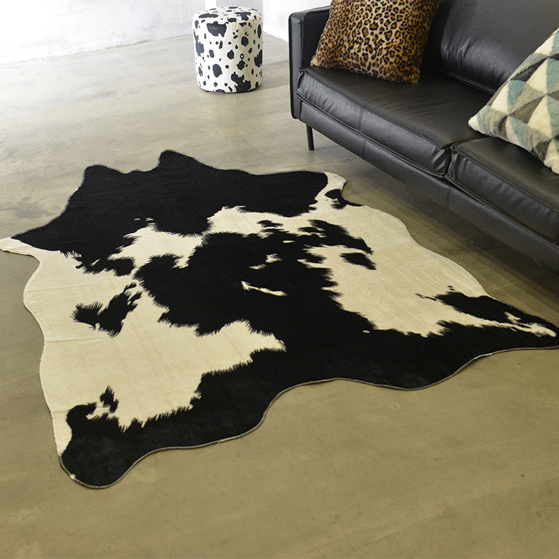 Grand tapis entier formé de vache noire avec le modèle animal d'imitation