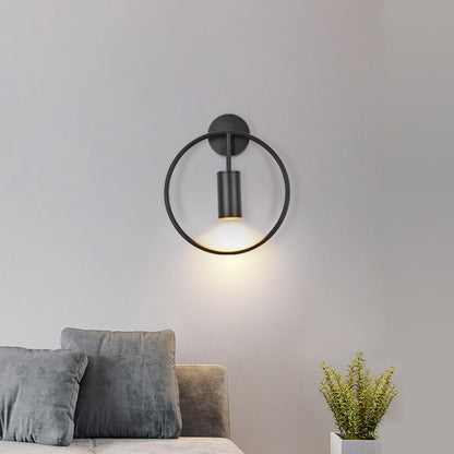 Round golden wall lamp