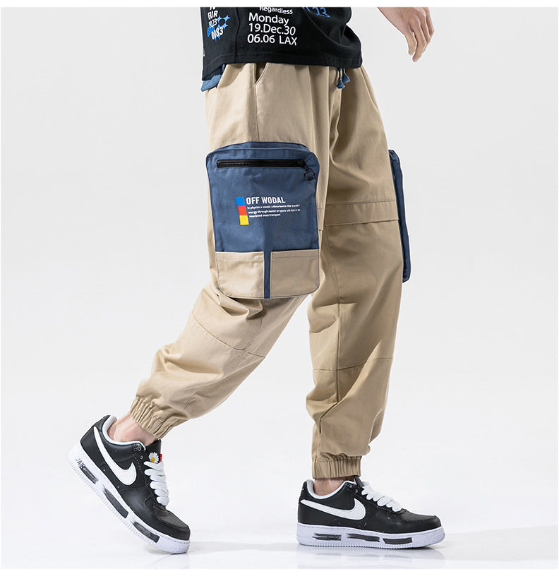 Pantalones cargo holgados con estampado de bloques de color y bolsillos grandes