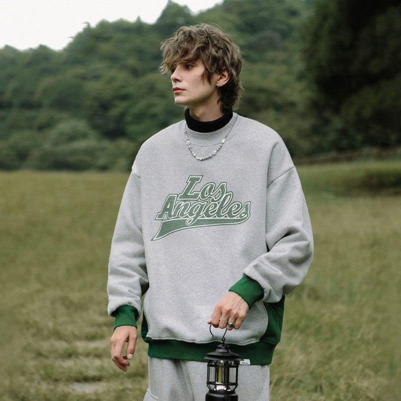 Pull imprimé brodé contrasté pour hommes