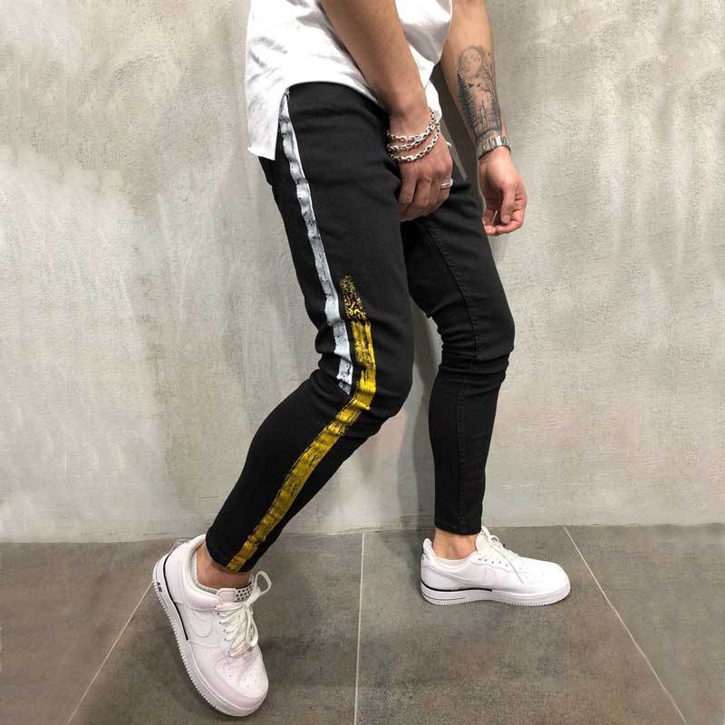 Striped printed denim slim legged black pants