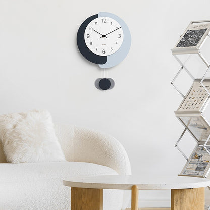 Reloj de pared oscilante silencioso sin perforaciones simple y moderno