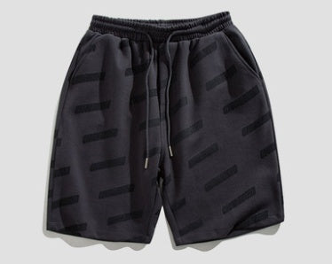 Monos estampados Pantalones cortos Tendencia de los hombres Pantalones de playa casuales Pantalones de chándal sueltos con cordón