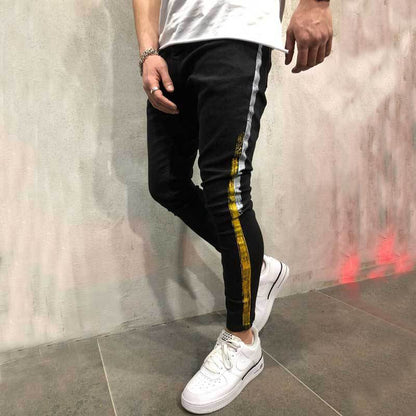 Striped printed denim slim legged black pants