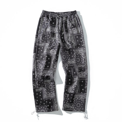 Pantalones anchos rectos con estampado completo de flores de anacardo de Hip Hop