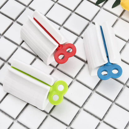 Dispositivo exprimidor de pasta de dientes, dispensador multifuncional, Clips para limpiador Facial, herramientas manuales de tubo perezoso, prensa, accesorios de baño