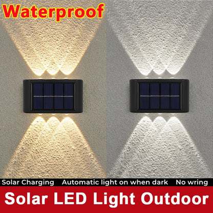 Lámpara de pared solar Luz LED solar Impermeable al aire libre Arriba y abajo Iluminación luminosa Luz cálida Balcón Patio Jardín Decoración Luz