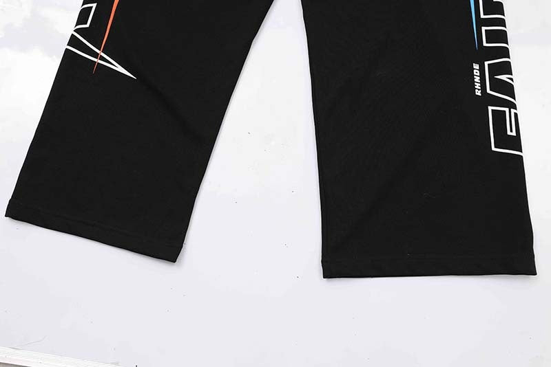 Pantalones deportivos con estampado de letras estilo carreras de motociclista retro para hombres y mujeres