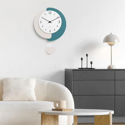 Reloj de pared oscilante silencioso sin perforaciones simple y moderno